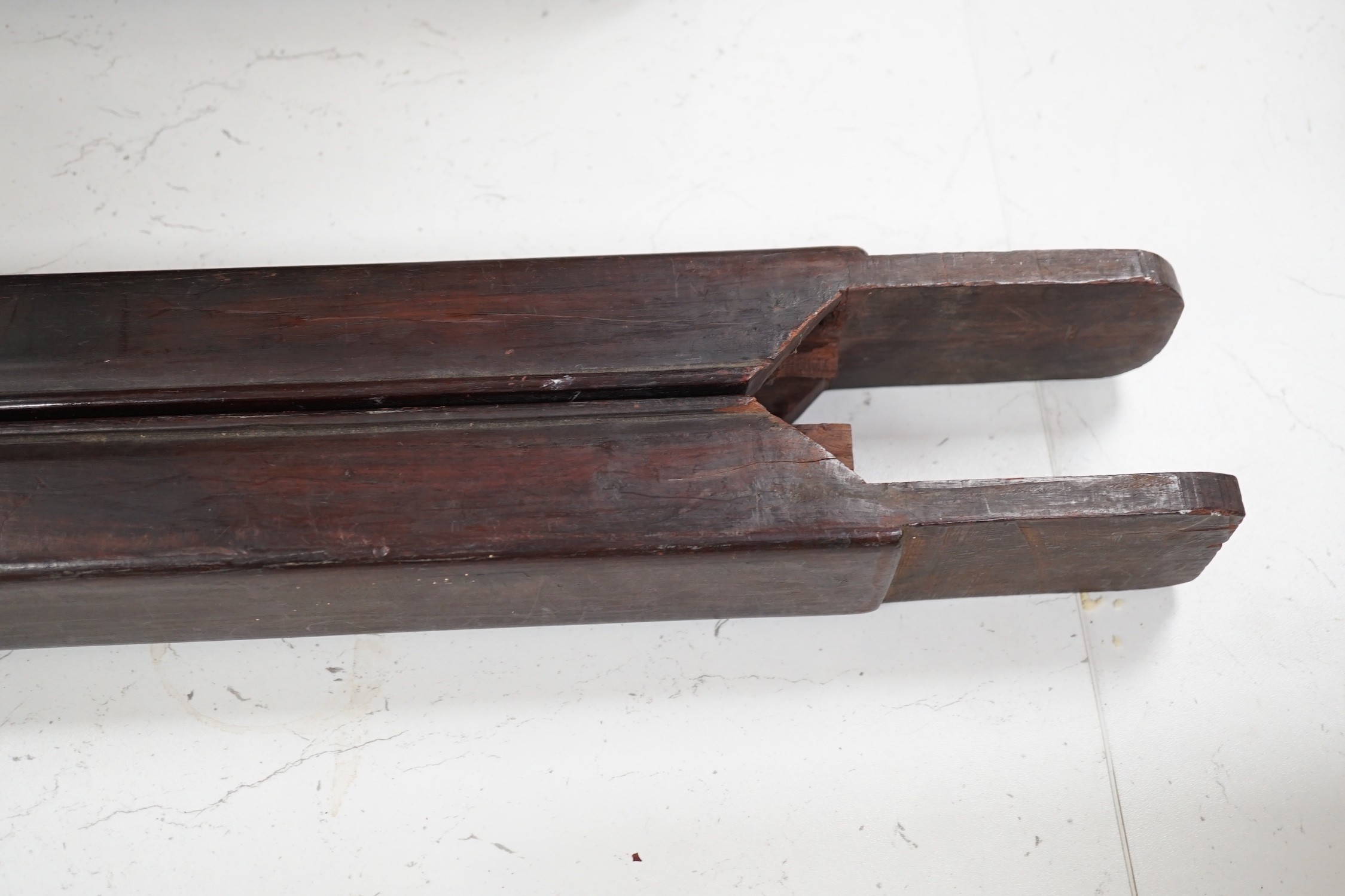 A pair of 19th century Chinese carved hardwood rails, 93cm